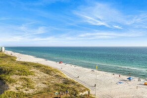 Enjoy a serene beach experience with access to the ocean via the walkway.