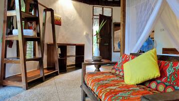 Bungalow Deluks, pemandangan kebun | 1 kamar tidur dan meja kerja