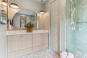 Shower, hair dryer, towels, soap