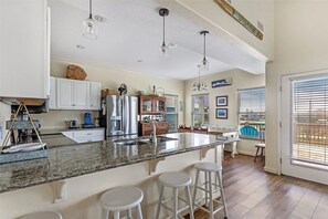 House, 4 Bedrooms | Private kitchen | Fridge, coffee/tea maker - Family Tides 4 Bedroom Home by RedAwning (Port Bolivar)