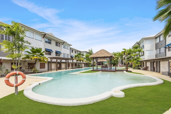 Enjoy a resort-style lifestyle with a stunning. shared lagoon pool amidst well-maintained gardens.