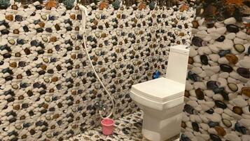 Shower, rainfall showerhead, towels, soap