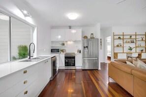 Fridge, microwave, oven, stovetop - Tropical Refuge—Classic Queenslander Paradise (Aeroglen)