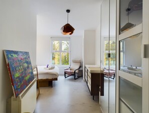 2 dormitorios, tabla de planchar con plancha, wifi gratis y ropa de cama