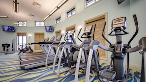 A gym with treadmills, elliptical machines, and a stationary bike. - 9 Bedroom Family Friendly Retreat - Private Pool (Davenport)