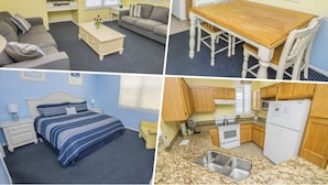 A hotel room with a bed, a sofa, a dining table, and a kitchen area. - James' Runaway Beach Condo (Kissimmee)
