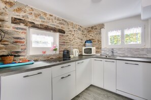 Fridge, microwave, dishwasher, coffee/tea maker