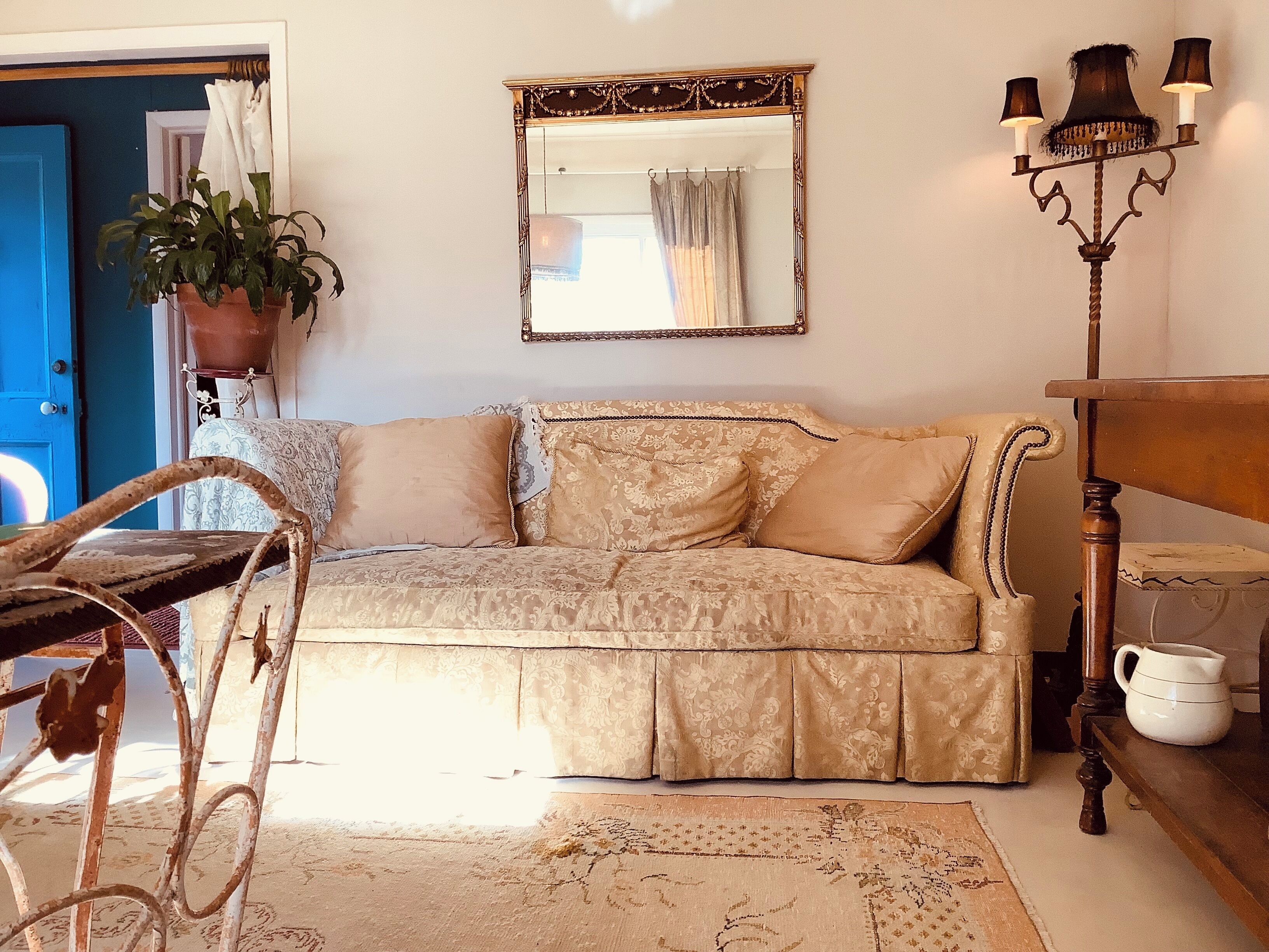 Bohemian Glow, this cozy home is surrounded by birds and a wildlife habitat.  