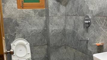 Shower, rainfall showerhead, towels, soap