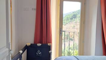 2 bedrooms, iron/ironing board, travel crib, bed sheets