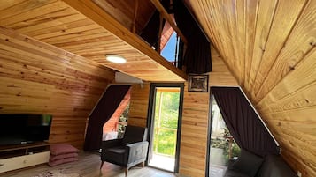 Honeymoon Cottage | Living area | Flat-screen TV, fireplace, DVD player, heated floors