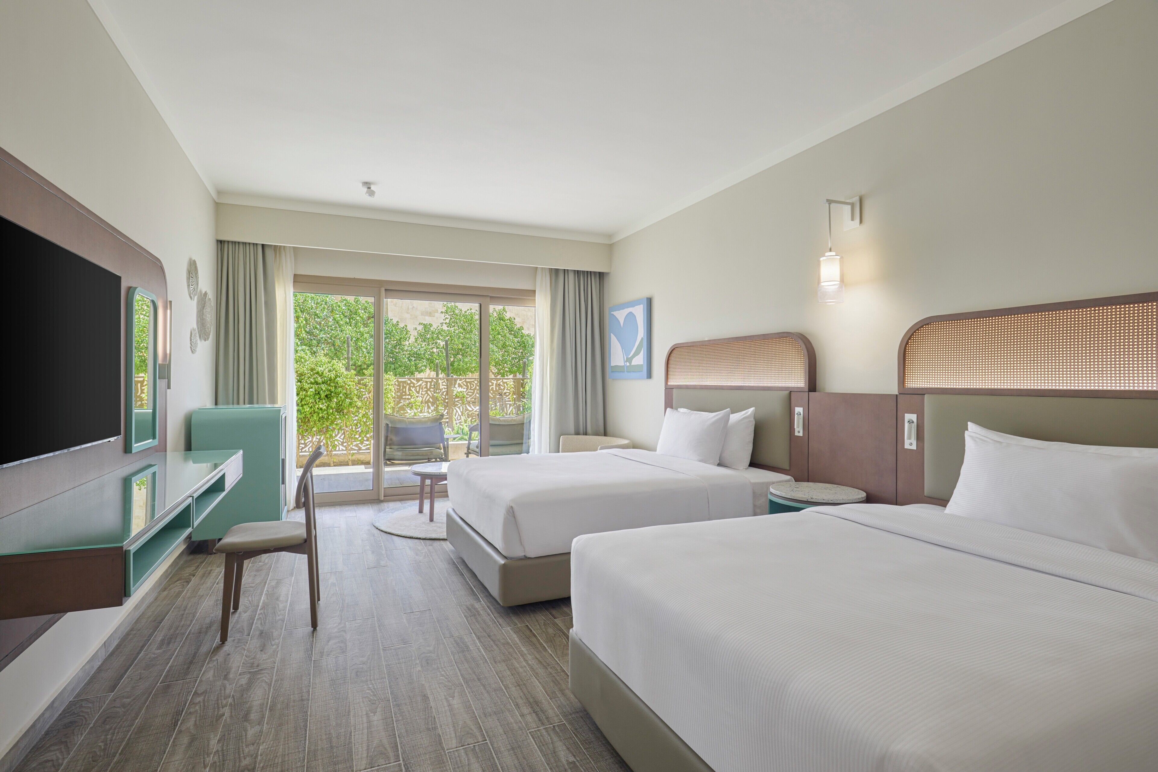 Premium bedding, down comforters, pillowtop beds, in-room safe