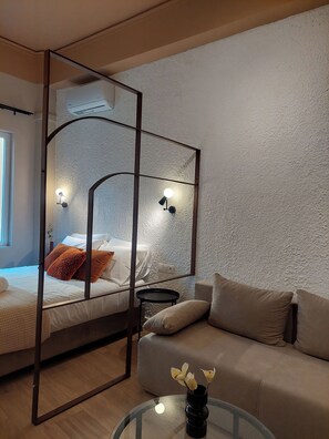 Design Apartment, 1 Queen Bed with Sofa bed, Kitchenette, City View | Living area | 42-inch Smart TV with digital channels - Terrazzo City Apts (Heraklion)