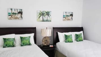 Deluxe Double Room, Partial Sea View, Poolside | Premium bedding, memory-foam beds, desk, laptop workspace