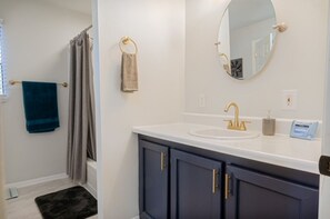 Hair dryer, towels, soap, toilet paper