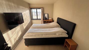 Economy Condo | Desk, laptop workspace, free WiFi