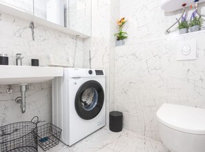 Shower, hair dryer, towels