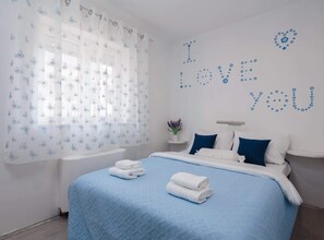 2 dormitorios, tabla de planchar con plancha, wifi y ropa de cama
