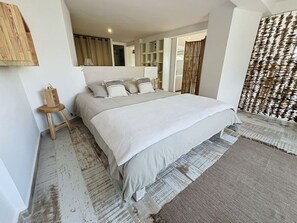 1 bedroom, desk, iron/ironing board, travel crib