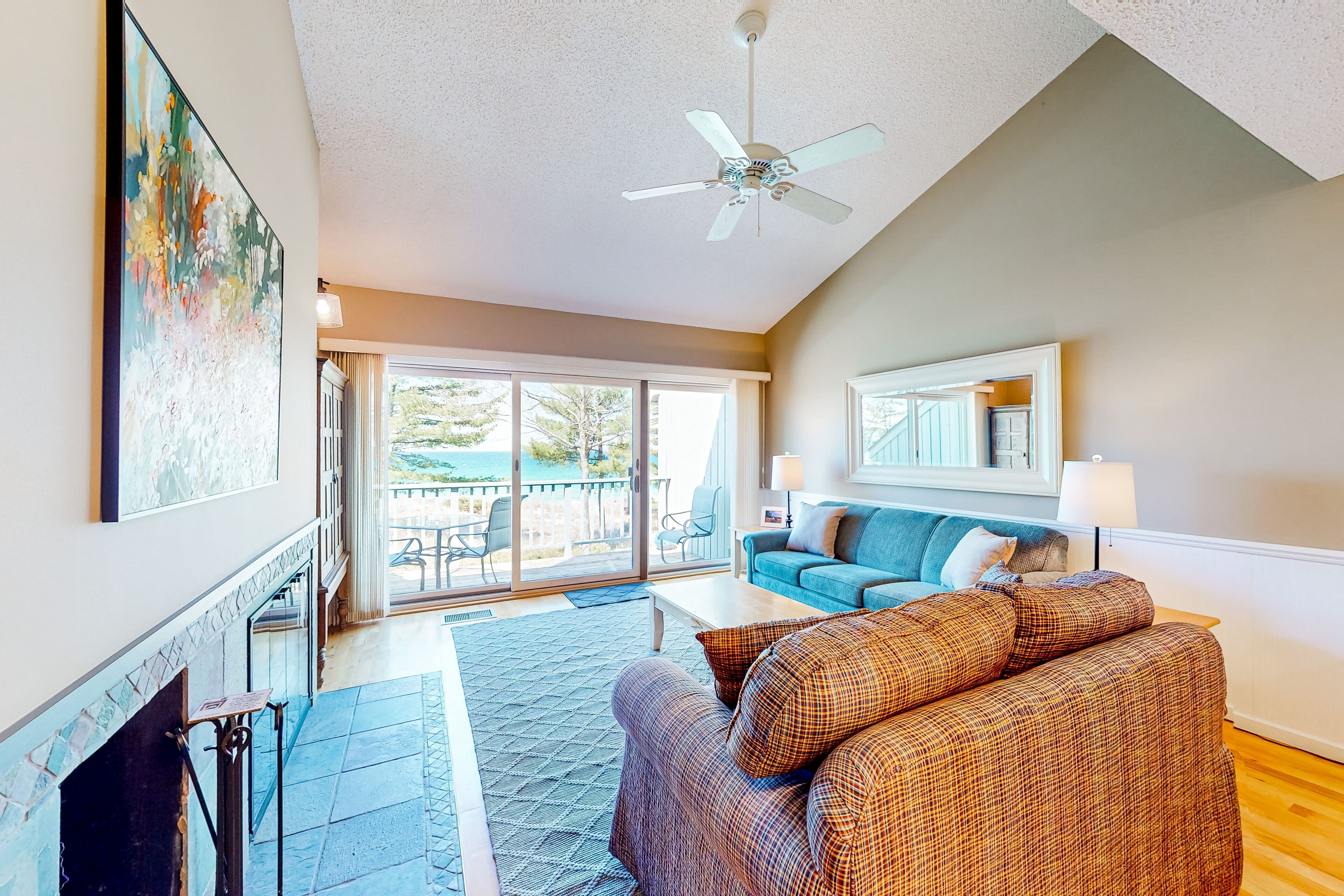 Waterfront condo near skiing with beach access, on-site golf & fireplace