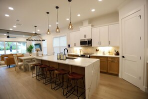 Fridge, microwave, oven, stovetop - The Best Home in NSB - Luxury Beach Retreat - Resort Style Pool Area (New Smyrna Beach)