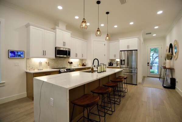 Fridge, microwave, oven, stovetop - The Best Home in NSB - Luxury Beach Retreat - Resort Style Pool Area (New Smyrna Beach)