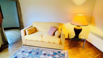 Family Apartment | Living area | 80-cm Smart TV with digital channels