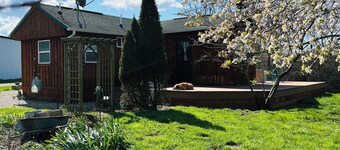 Located behind a tree filled garden near our horse barn and Farm Sanctuary.