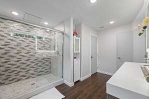 Shower, hair dryer, towels, soap