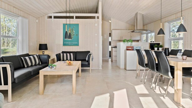 A modern interior with a living area, dining space, and kitchen. - Pet friendly home in ålbæk with WiFi (Ålbæk)