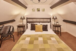 2 dormitorios, tabla de planchar con plancha, cuna de viaje