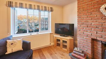 Télévision, lecteur de DVD, livres, vidéothÚque