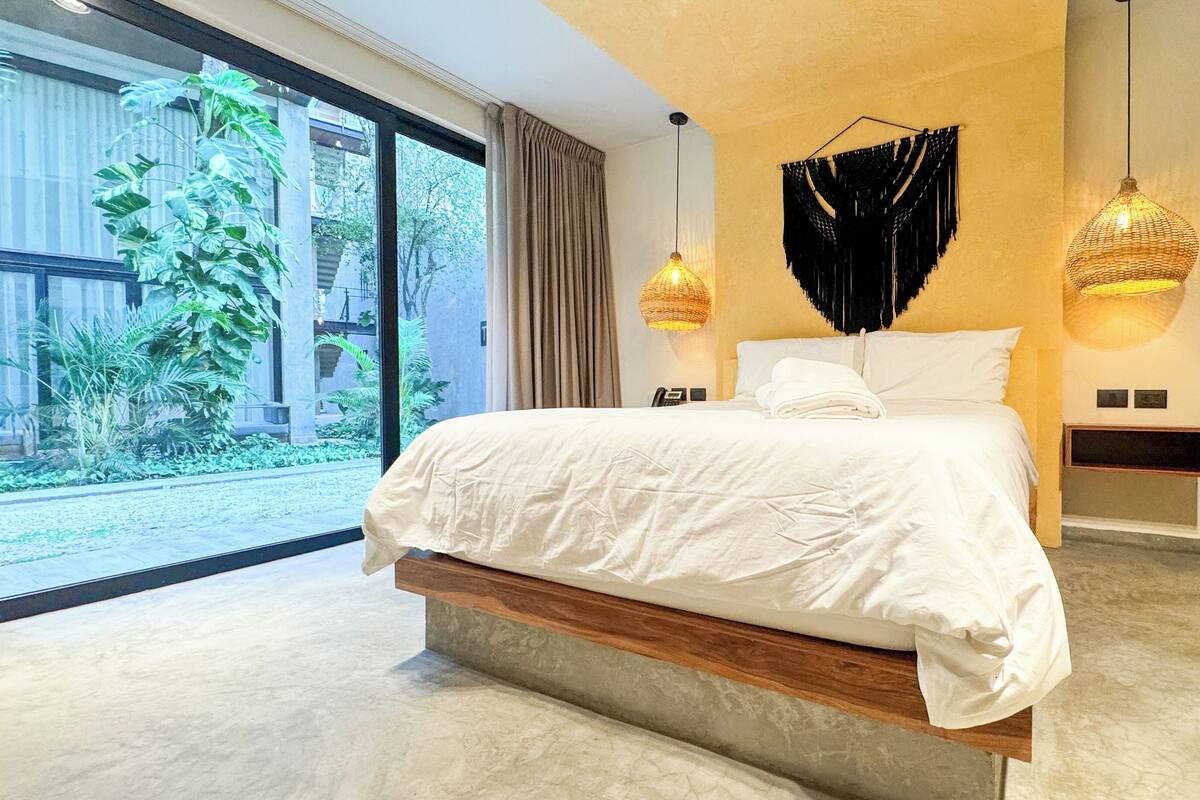 Luxury Apartment, 1 Bedroom, Garden View | Premium bedding, down comforters, in-room safe, blackout drapes