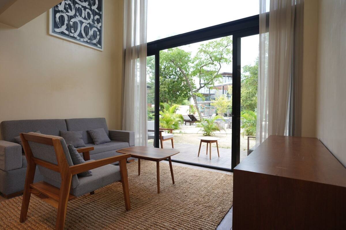 Premium Apartment, 1 Bedroom, Garden View | Living area | 42-inch Smart TV with digital channels, Netflix, streaming services