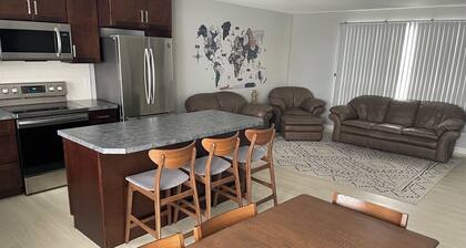 Cozy Renovated 5 Bedroom Home 2 Bath with large deck and hot tub.