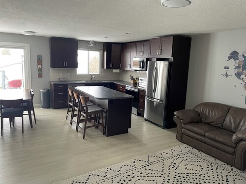 Cozy Renovated 5 Bedroom Home 2 Bath with large deck and hot tub. 