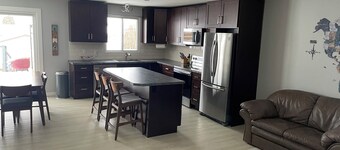 Cozy Renovated 5 Bedroom Home 2 Bath with large deck and hot tub. 