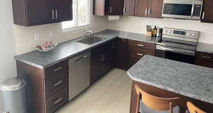 Cozy Renovated 5 Bedroom Home 2 Bath with large deck and hot tub.