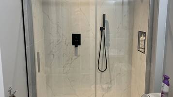 Shower, hair dryer, towels, soap