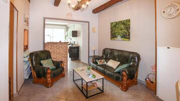 Una Smart TV, un reproductor estéreo