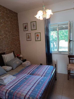 2 dormitorios, tabla de planchar con plancha, wifi gratis y ropa de cama