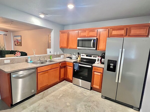 Fridge, microwave, oven, stovetop - Stunning New Building Listing Near Shopping Havens & Fort Cavazos. (Killeen)