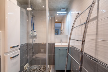 Shower, free toiletries, hair dryer. Holiday Home 'Les Eaux Vives 1' with Sea View, Shared Pool and Private Terrace