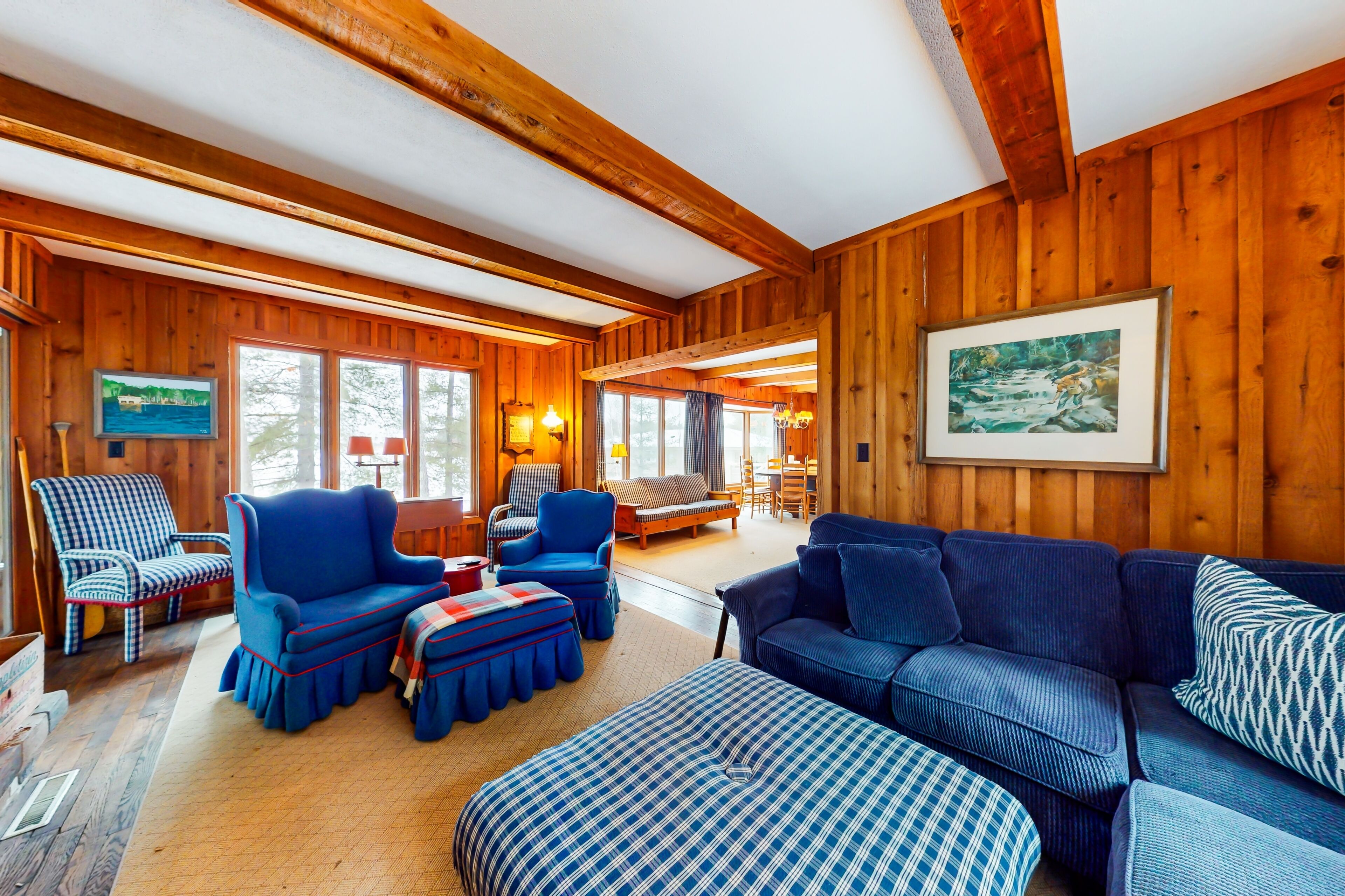 Lakeside retreat with four bedrooms, yard, dock, balcony, & washer/dryer