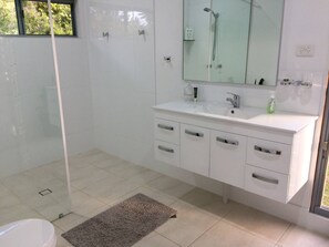 Shower, hair dryer, towels, soap