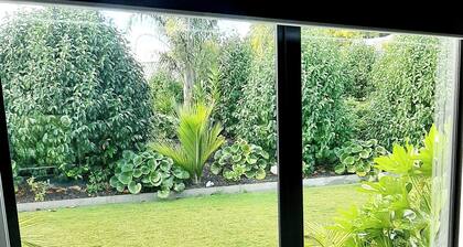 TREE VIEW STUDIO is private & spacious. Semi rural but close to all amenities.