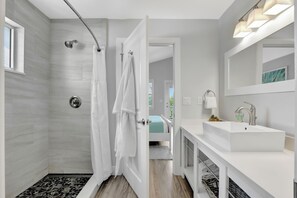 Shower, hair dryer, towels