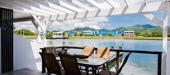 Condo for 4 max/sun sea and sand activities /private dock on back patio/