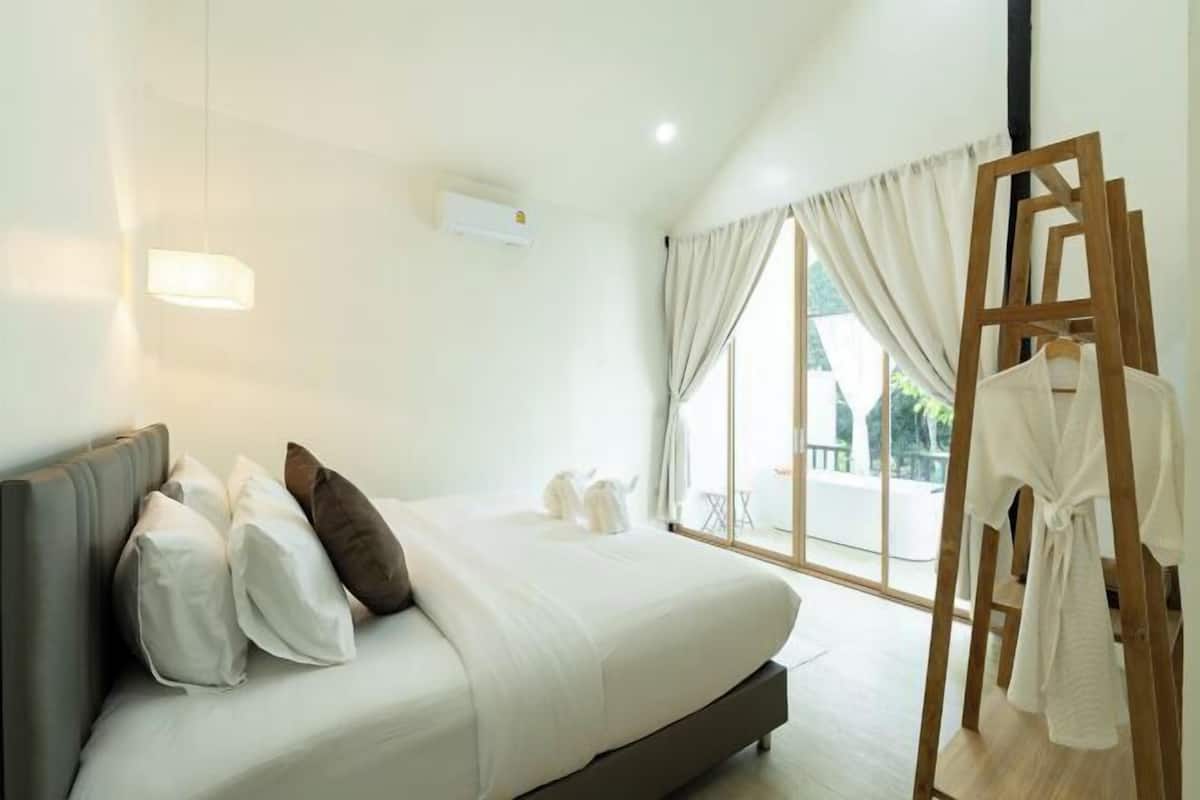 2 habitaciones, minibar y caja de seguridad en la habitación