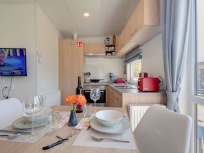 Fridge, oven, cookware/dishes/utensils